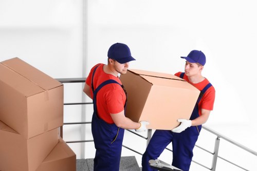 Packed boxes and moving truck for France removals planning