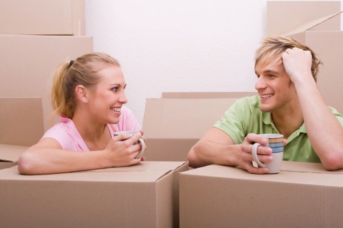 Removal team preparing a house move in a French city apartment block