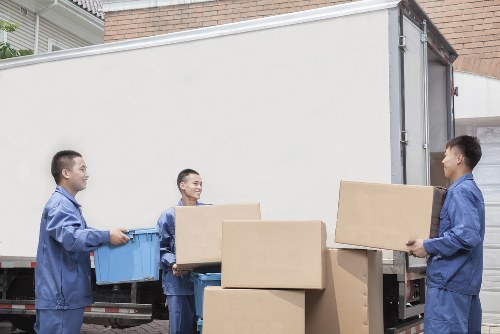 Household furniture and moving boxes prepared for a move in France