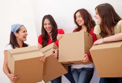 Apartment movers handling stairs and access in a French city