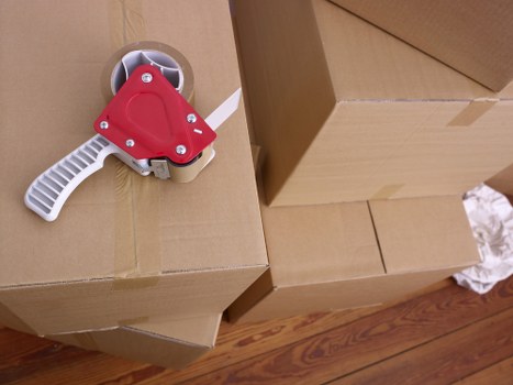 Local packing team preparing boxes for a residential relocation