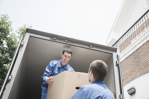Staff using lifting aids and secure handling methods