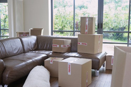 Packed moving boxes and furniture ready for transport in France